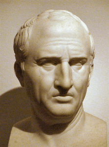 A bust of an older man with a bald head.