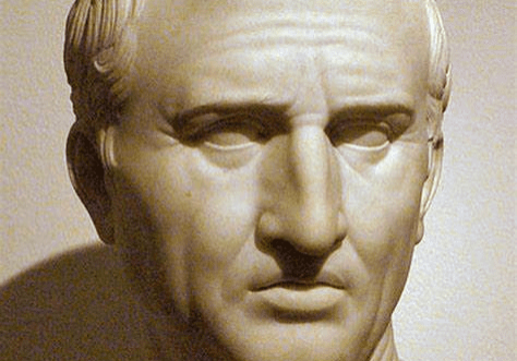 A bust of an older man with a bald head.